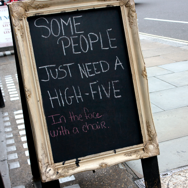 high five in the face with a chair