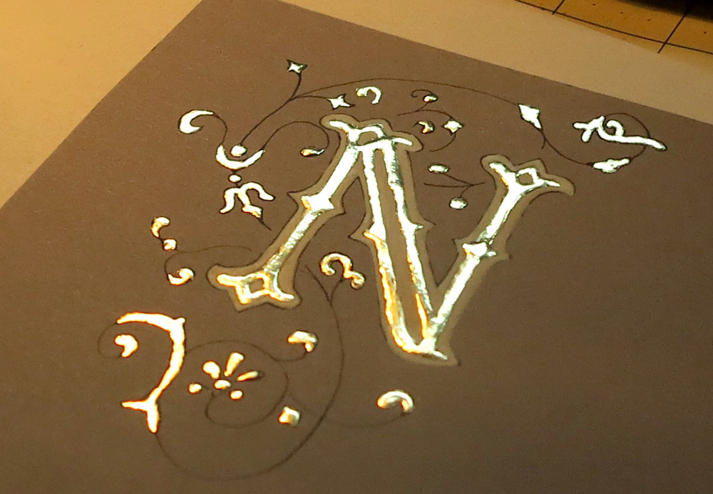 Illuminated letters, N